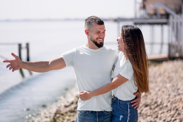 Couple hanging out together on the beach