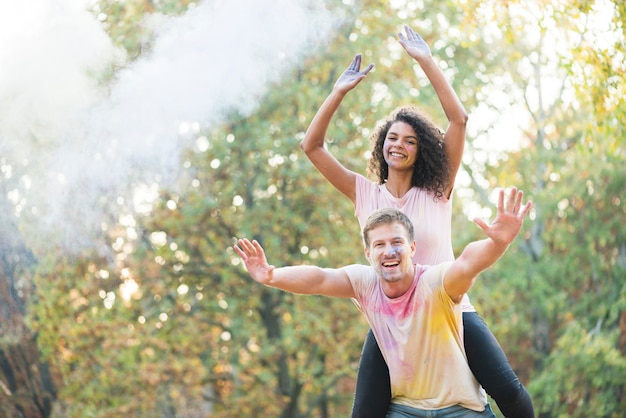 Couple happily posing at festival