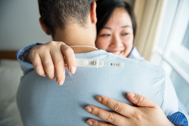 A couple happy about pregnancy test result