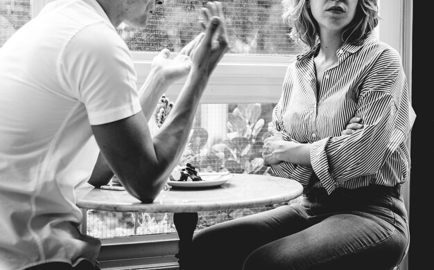 Couple having an argument at the cafe