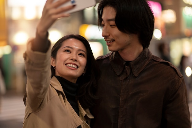 Free photo couple having a date at night