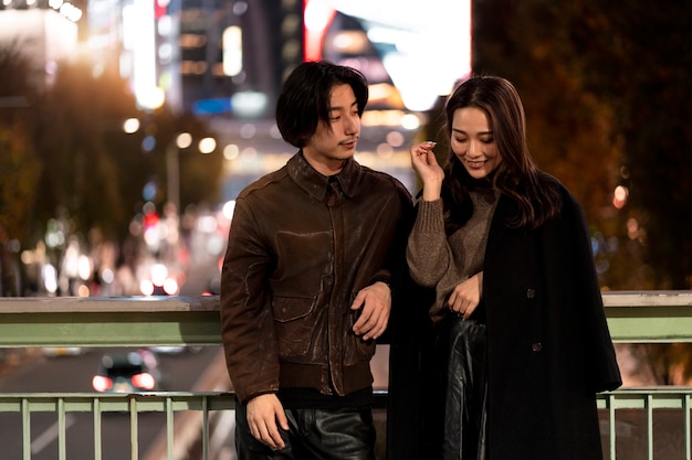 Free photo couple having a date at night