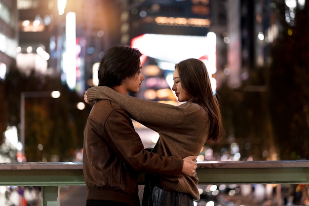 Free photo couple having a date at night