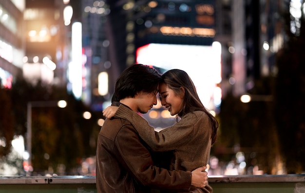 Free photo couple having a date at night