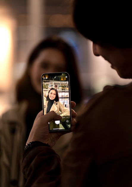 Free photo couple having a date at night