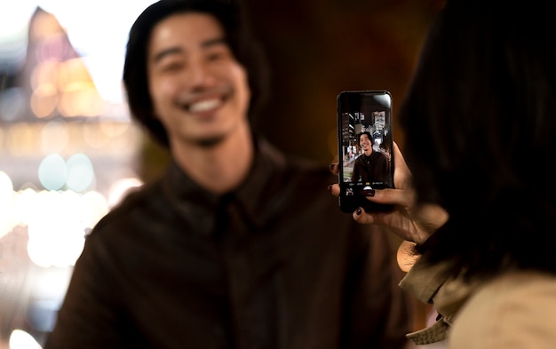 Free photo couple having a date at night