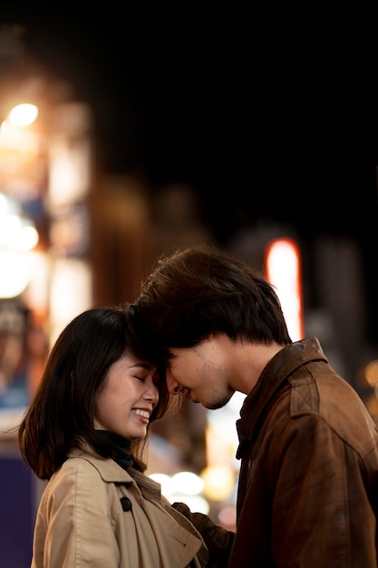 Free photo couple having a date at night