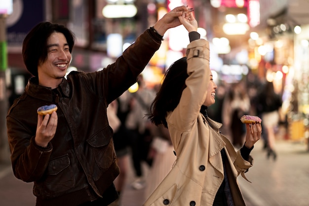 Free photo couple having a date at night