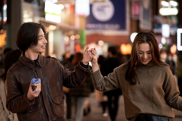 Free photo couple having a date at night