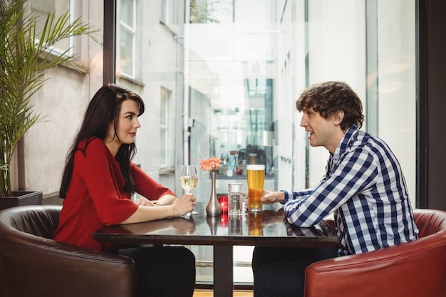 Couple having drinks together