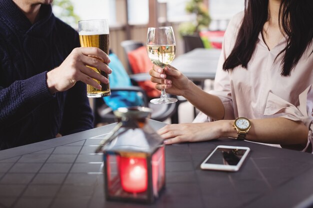 Couple having drinks together