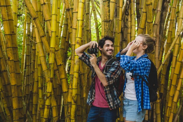 Couple having fun in bamboo forest