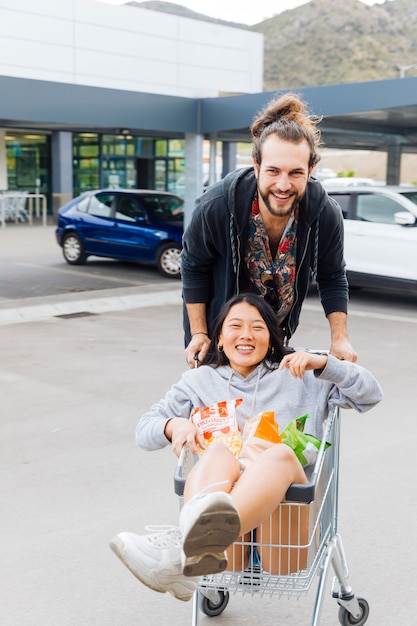 Couple having fun on parking lot 