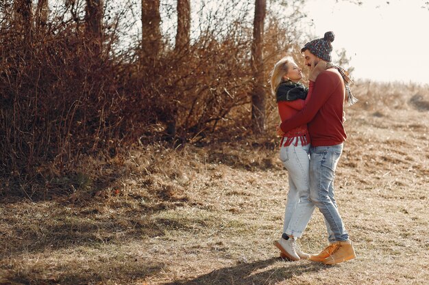 Couple having fun in a spring forest