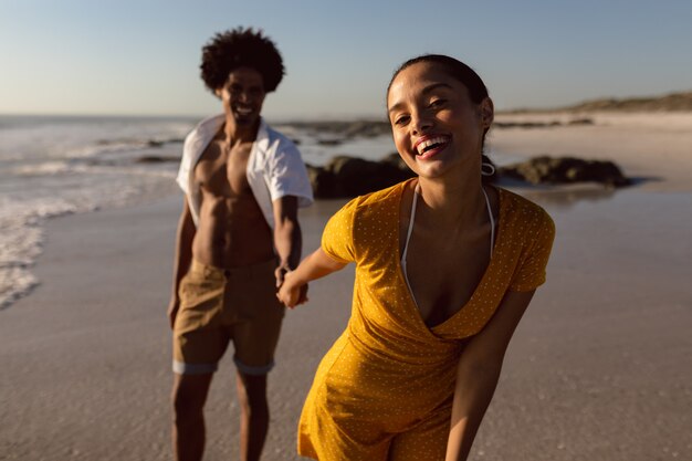 Couple having fun together on the beach