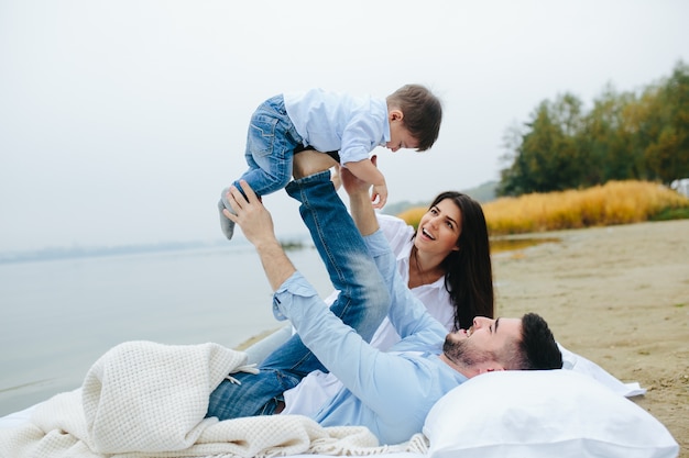 Couple having fun with son