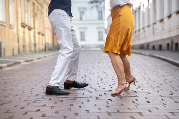 Couple having a latin dance performance in the city