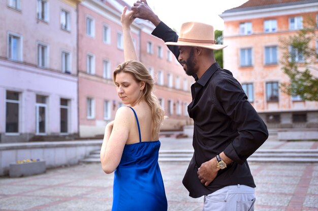 Couple having a latin dance performance in the city