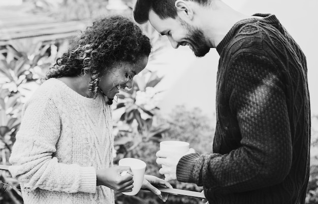 Couple having take away coffee