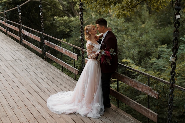 Free photo couple having their wedding in the woods