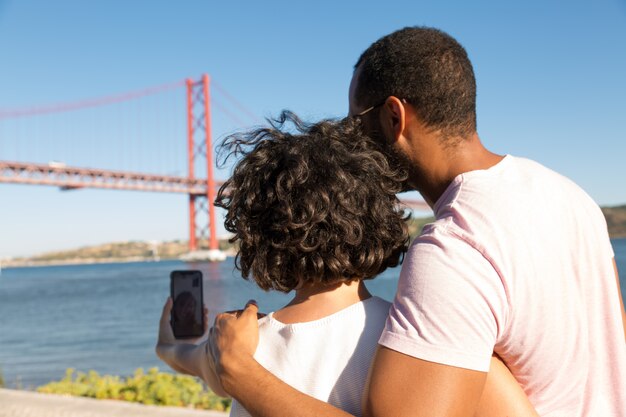 Couple having video chat via smartphone