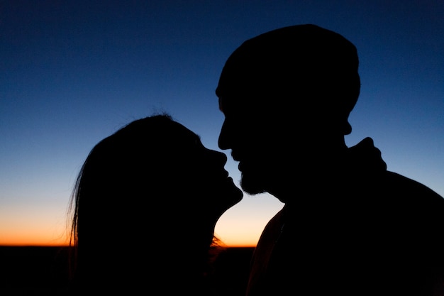 Free photo couple hiking together in the wilderness