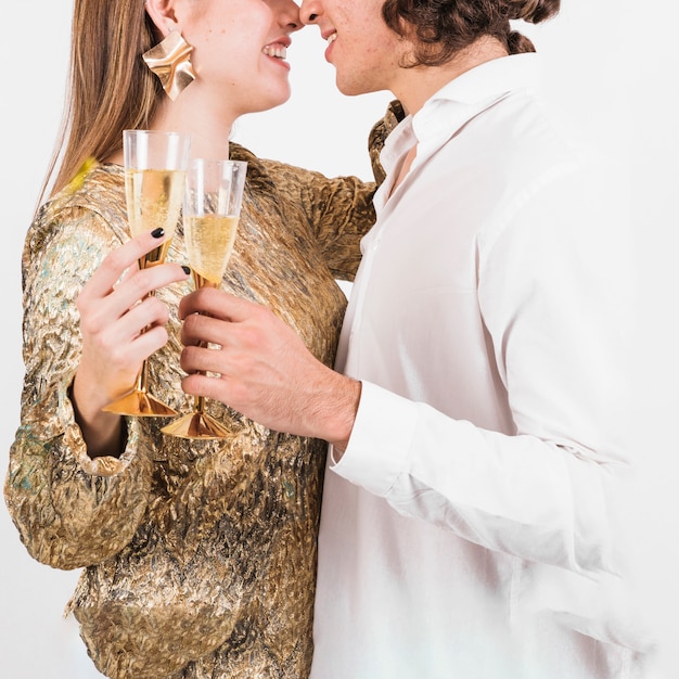 Couple holding glasses of champagne 