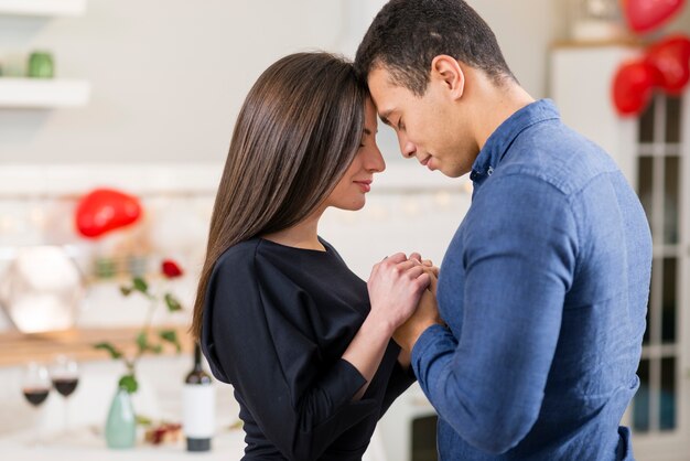 Couple holding hands on valentine's day with copy space