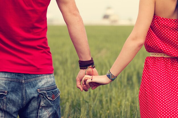 Couple holding hands