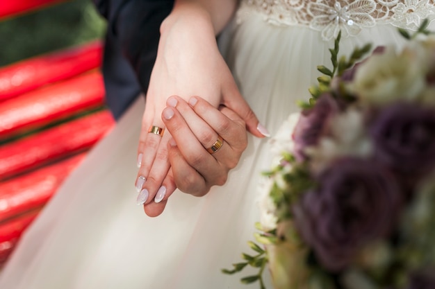 Couple holding hands