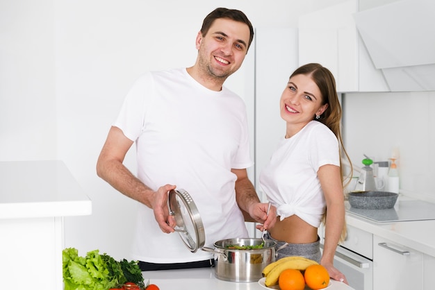 Couple at home cooking