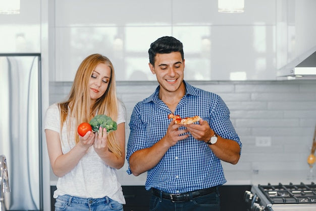 couple at home in a kitchen