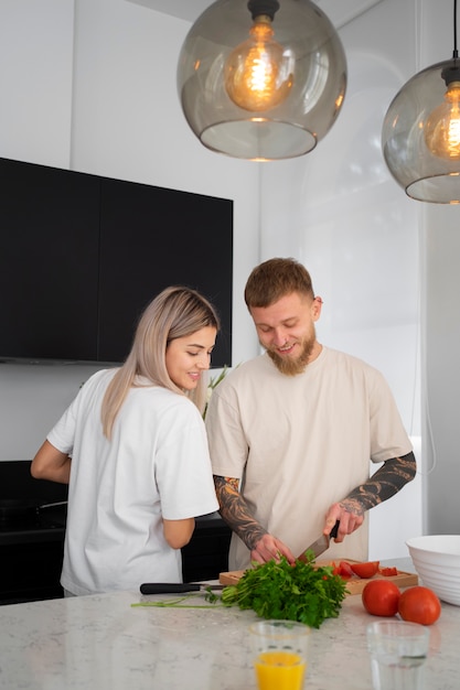 Free photo couple at home spending time together