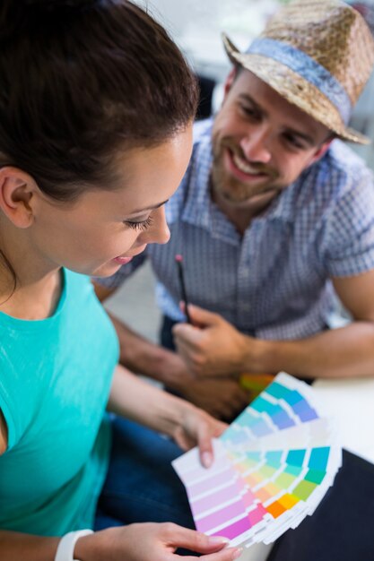 Couple interacting over color swatch