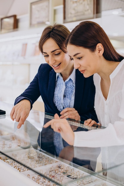 Couple at jewelry shop choosing a ring together