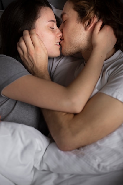 Couple kissing and cuddling