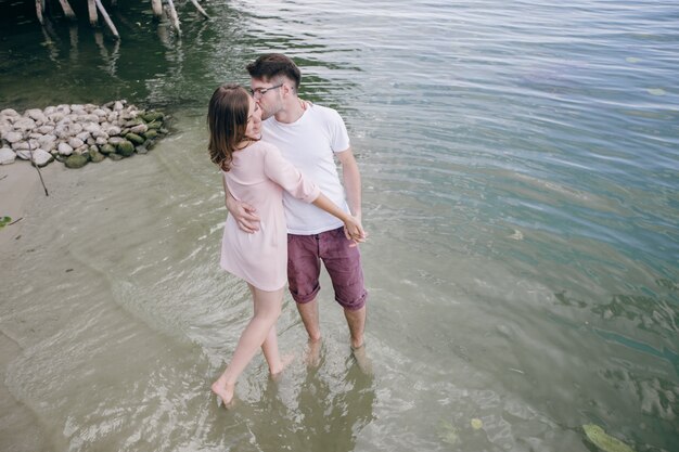 Couple kissing in the sea water