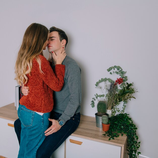 Couple kissing and touching each other