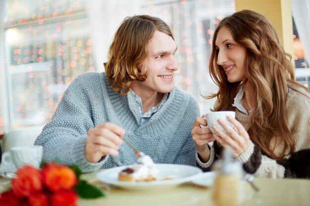 Couple laughing and looking each other