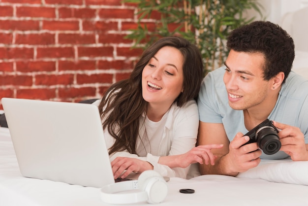 Couple learning how to use a camera photo