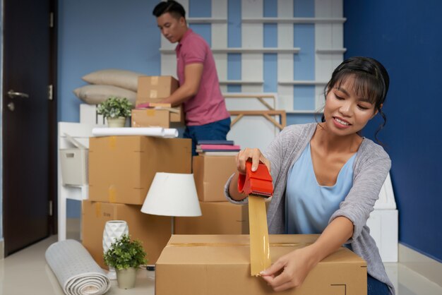 Couple Leaving Apartment