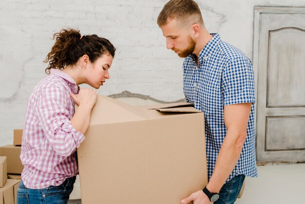 Couple looking inside box