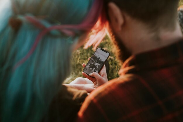 Couple looking at phone screen