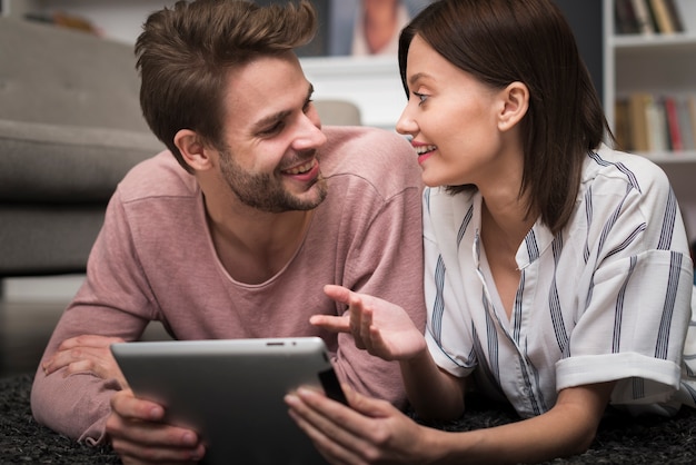 Couple looking at tablet