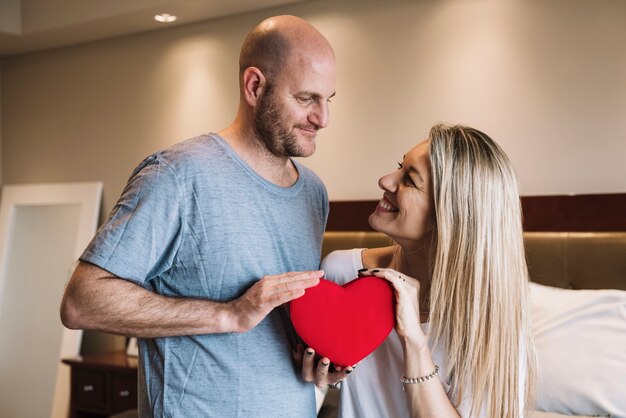 Couple in love in bedroom