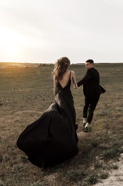 couple in love in black dress and suit