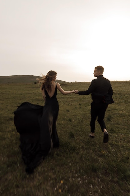 couple in love in black dress and suit