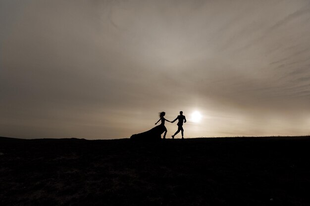 couple in love in black dress and suit