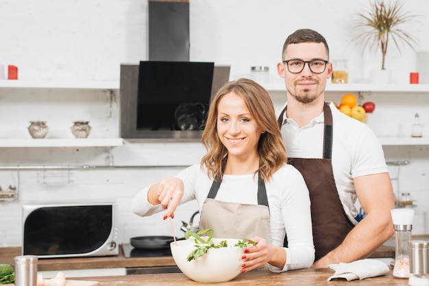 Couple in love cooking together