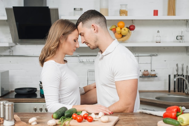 Couple in love cooking together